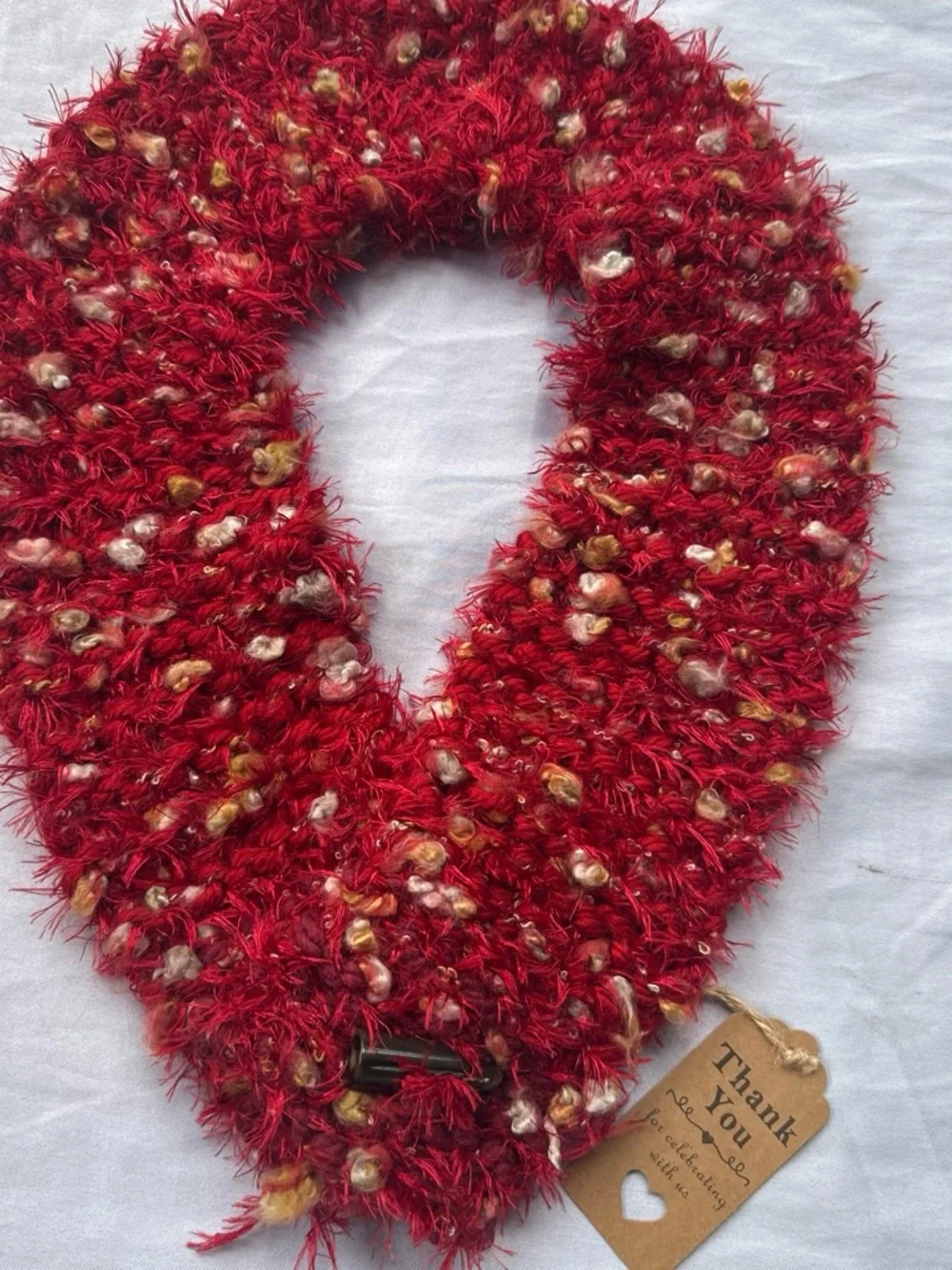 Cozy Red Textured Loop Scarf with Multicolor Pom Accents